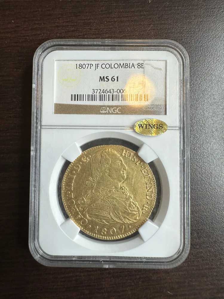 Actual submitted photograph 1 of 1807 P JF Colombia 8 Escudo, MS61