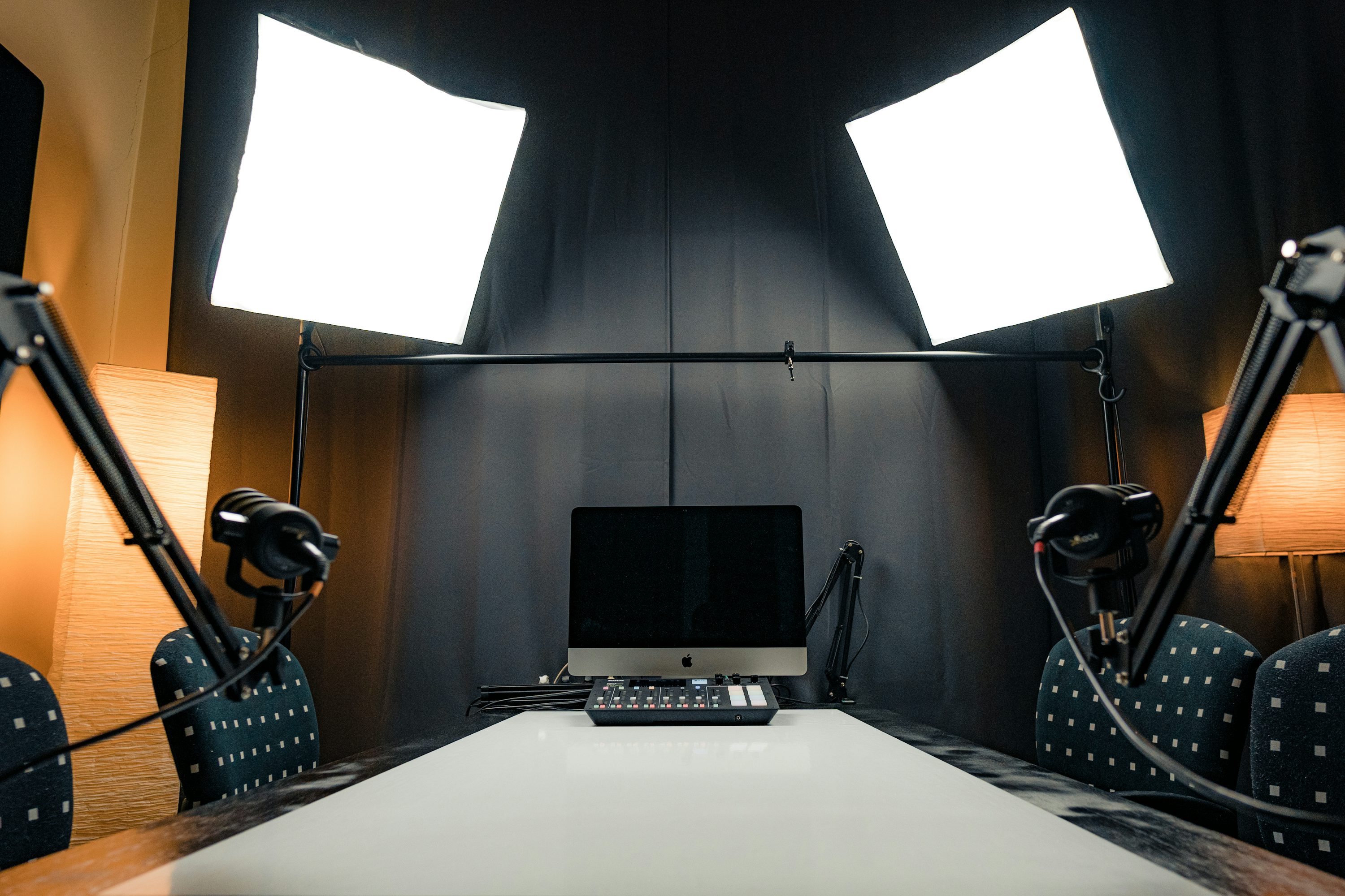 Microphones, recording desk and lights in a webinar studio; illustrative photo, not an ASG event
